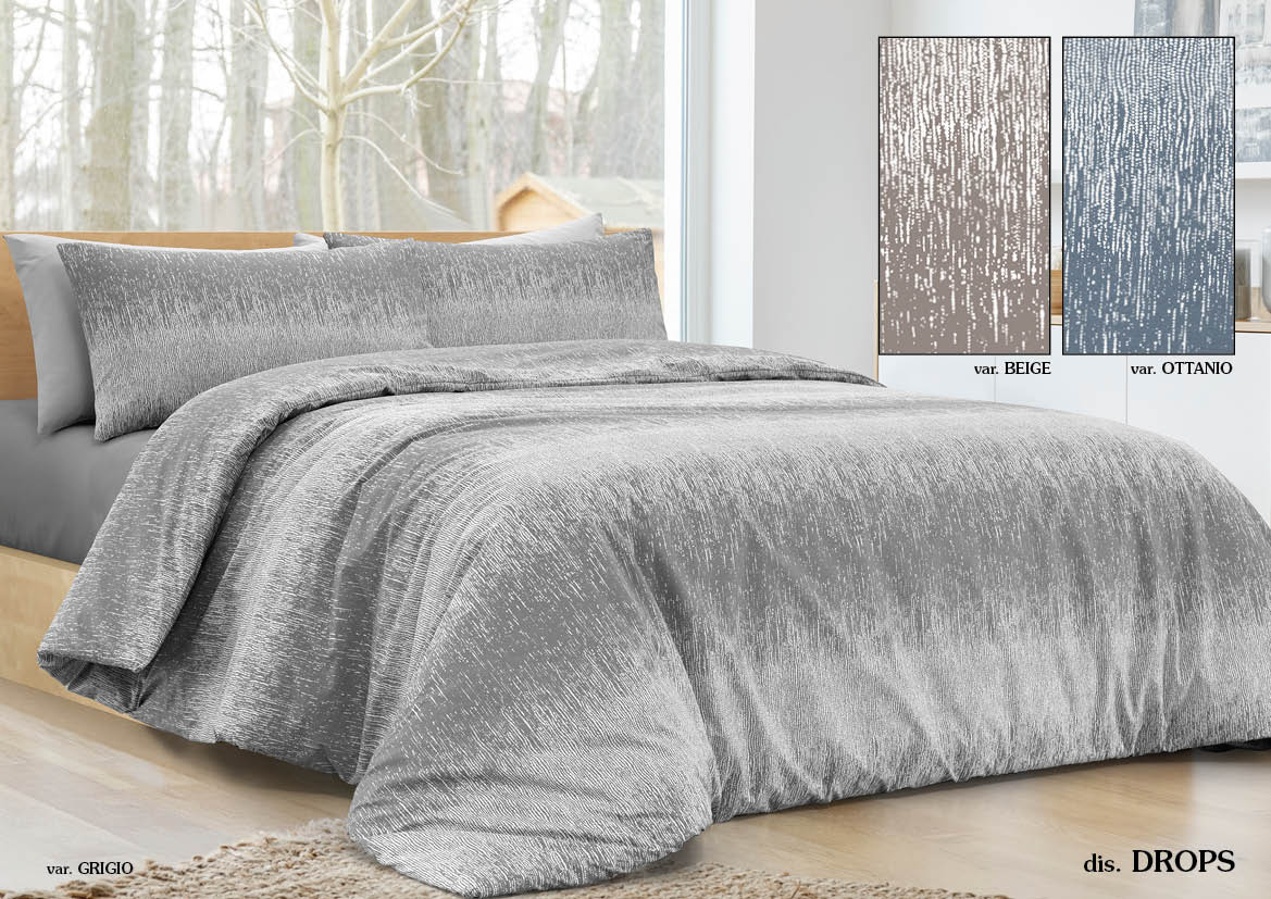 Copripiumino grigio sfumato in grigio chiaro su letto