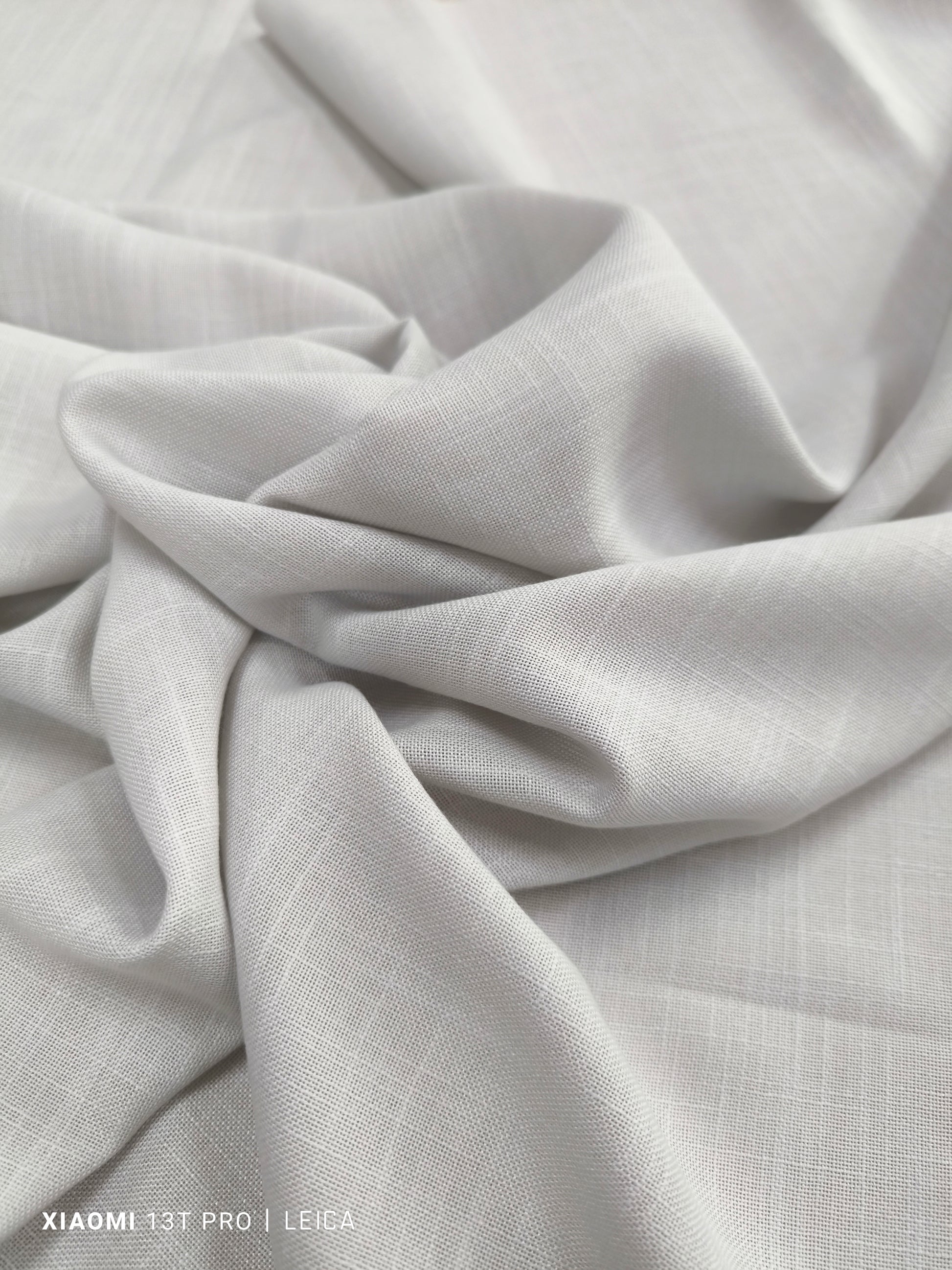 Primo piano della trama di tessuto grigio