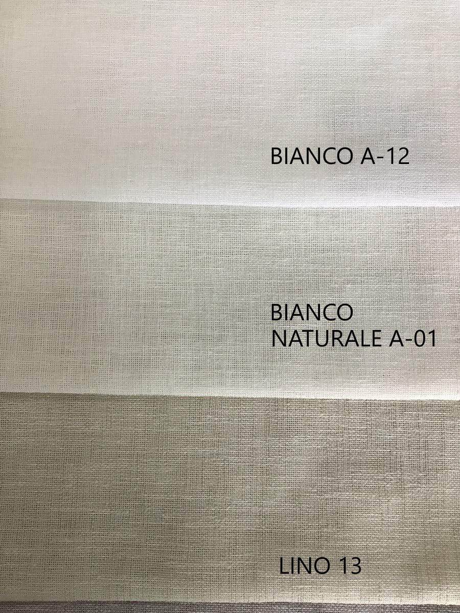 Cartella colori tessuto effetto lino con campioni nei colori bianco, bianco naturale e lino per tende e arredamento.